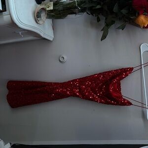 Dillards homecoming dress worn once, size 2 and tailored to fit a 24 inch waist.